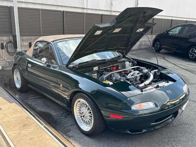 ユーノスロードスター Vスペシャル タンレザーシート 専用スカッフプレート 専用フロアマット プッシュスタート オートエグゼマフラー BBSアルミ NPG車高調 KENWOODツイーター CD/MDレシーバー ETC 記録簿13枚(75枚目)