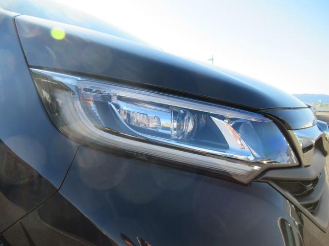 フリードハイブリッド ハイブリッド・Ｇブラックスタイル　ギャザズ９インチナビ　Ｂｌｕｅｔｏｏｔｈ　ＣＤ・ＤＶＤ再生　バックカメラ　前後ドラレコ　両側電動スライド　シートヒーター　後席モニター　モデューロエアロ　純正アルミホイール　ロールサンシェード（12枚目）