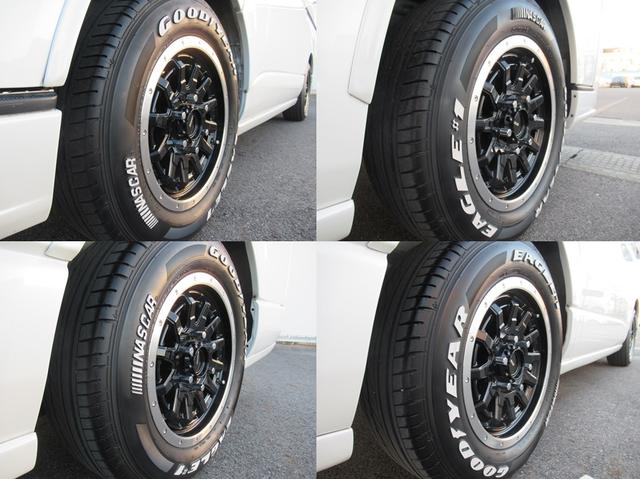 ハイエースバン スーパーＧＬダークプライムＩＩ　アルパインナビ　Ｂｌｕｅｔｏｏｔｈ　ＣＤ・ＤＶＤ再生　フルセグＴＶ　バックカメラ　前後ドラレコ　社外アルミホイール　純正アルミホイール付きスタッドレスタイヤ　ベッドキット　ＡＣ１００Ｖ電源付き（14枚目）