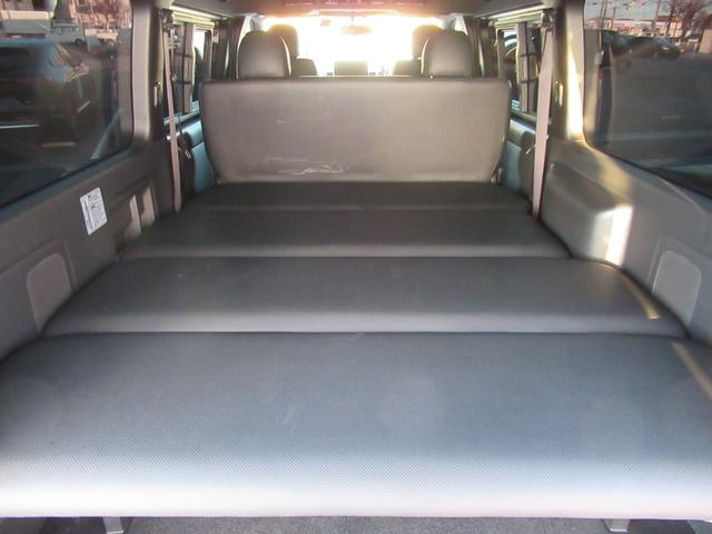ハイエースバン スーパーＧＬダークプライムＩＩ　アルパインナビ　Ｂｌｕｅｔｏｏｔｈ　ＣＤ・ＤＶＤ再生　フルセグＴＶ　バックカメラ　前後ドラレコ　社外アルミホイール　純正アルミホイール付きスタッドレスタイヤ　ベッドキット　ＡＣ１００Ｖ電源付き（39枚目）