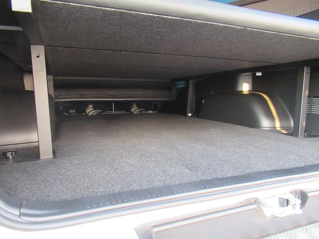 ハイエースバン スーパーＧＬダークプライムＩＩ　アルパインナビ　Ｂｌｕｅｔｏｏｔｈ　ＣＤ・ＤＶＤ再生　フルセグＴＶ　バックカメラ　前後ドラレコ　社外アルミホイール　純正アルミホイール付きスタッドレスタイヤ　ベッドキット　ＡＣ１００Ｖ電源付き（40枚目）