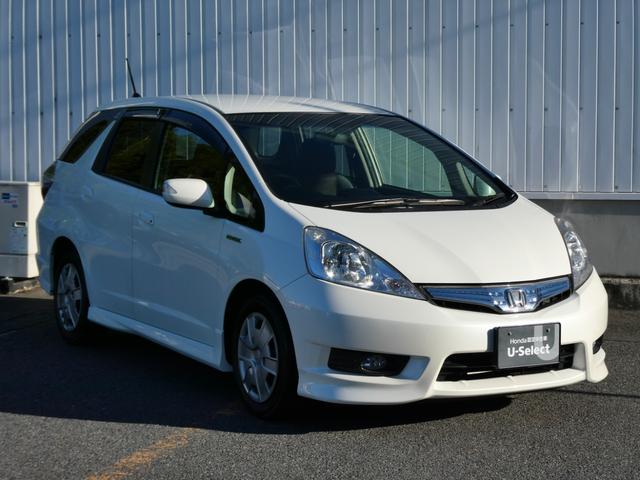 フィットシャトルハイブリッド ハイブリッドファインライン 純正ナビ・バックカメラ・ETC付 ETC車載器 アイドリングストップ オートエアコン エアバッグ パワーウインドウ Wエアバック キーレス DVD VSA オートクルーズコントロール ABS 地デジ(14枚目)