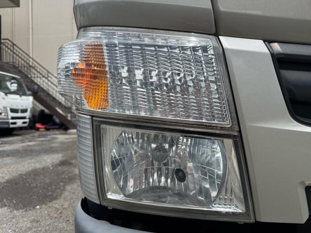 キャンター ＭＴ５　２トン　２ｔ　標準ロング　ロング　平ボディ　ＭＴ５　２トン　２ｔ　標準ロング　ロング　荷台板張り　荷台塗装済み　３方開　あおり開封補助装置　ロープフック　電格格納ミラー　５トン限定準中型対応　荷寸４３２×１７９×３８　外寸５９９×１９３×２３３（24枚目）
