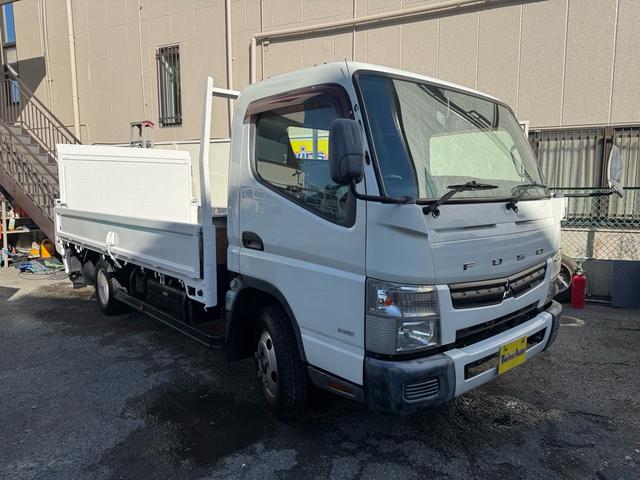 キャンター MT5 2トン 平ボディ パワーゲート 荷台鉄板張り 極東パワーゲート アーム式 ロープフック 3方開 あおり開封補助装置 タンク100L アドブルー キーレス 8t限定中型免許 車両重量2990kg 車両総重量5155kg 荷寸435×208×38(3枚目)