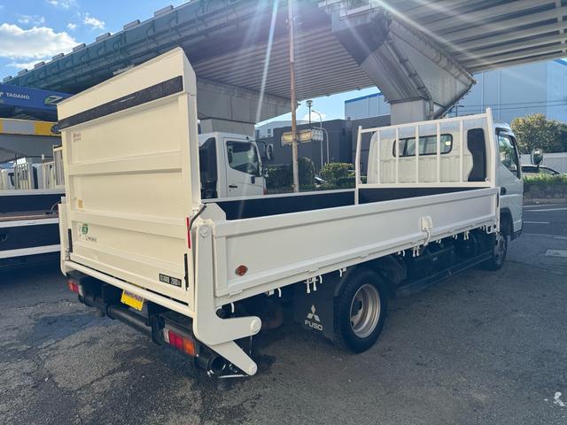 キャンター MT5 2トン 平ボディ パワーゲート 荷台鉄板張り 極東パワーゲート アーム式 ロープフック 3方開 あおり開封補助装置 タンク100L アドブルー キーレス 8t限定中型免許 車両重量2990kg 車両総重量5155kg 荷寸435×208×38(9枚目)