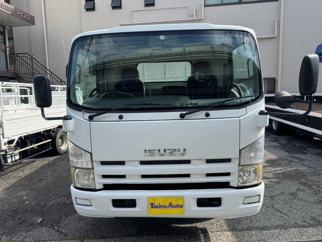 エルフトラック AT 4.45トン 全低床ボディ ワイドロング 荷台鉄板張 全席シートカバー付き 電格格納ミラー あおり開封補助装置 タンク100L 3方開 中型免許 車両重量3270kg 車両総重量7885kg 荷寸435×208×39 外寸614×217×232(5枚目)