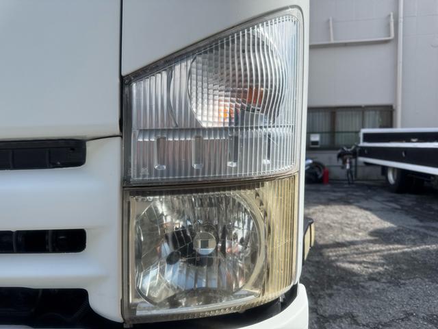 エルフトラック AT 4.45トン 全低床ボディ ワイドロング 荷台鉄板張 全席シートカバー付き 電格格納ミラー あおり開封補助装置 タンク100L 3方開 中型免許 車両重量3270kg 車両総重量7885kg 荷寸435×208×39 外寸614×217×232(23枚目)