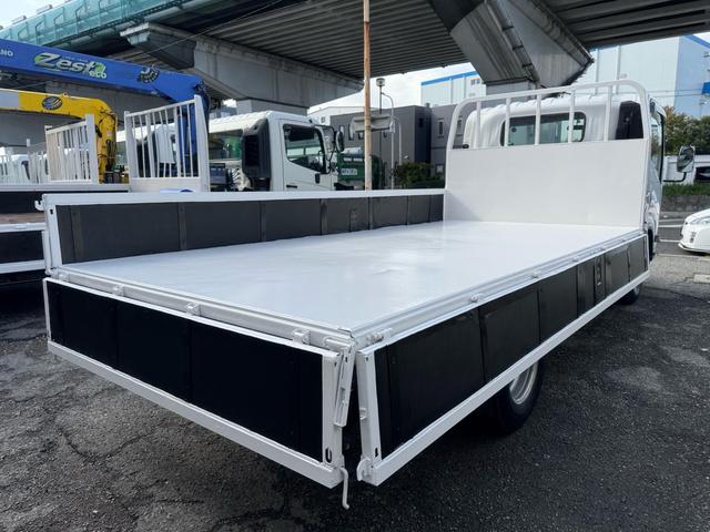 エルフトラック AT 4.45トン 全低床ボディ ワイドロング 荷台鉄板張 全席シートカバー付き 電格格納ミラー あおり開封補助装置 タンク100L 3方開 中型免許 車両重量3270kg 車両総重量7885kg 荷寸435×208×39 外寸614×217×232(27枚目)