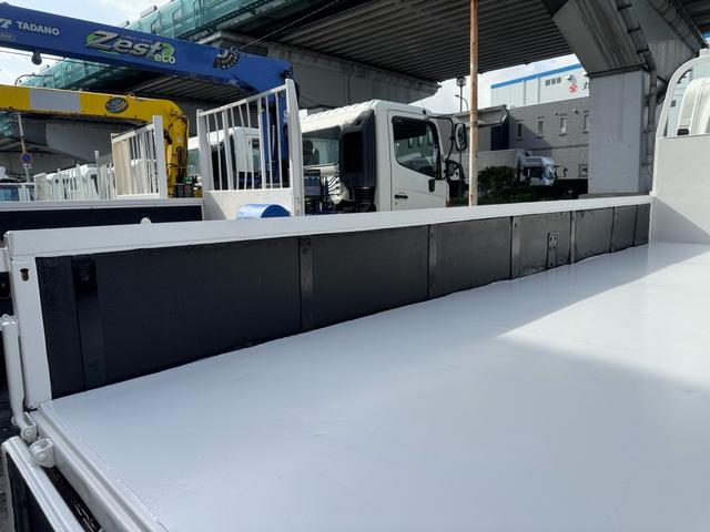 エルフトラック AT 4.45トン 全低床ボディ ワイドロング 荷台鉄板張 全席シートカバー付き 電格格納ミラー あおり開封補助装置 タンク100L 3方開 中型免許 車両重量3270kg 車両総重量7885kg 荷寸435×208×39 外寸614×217×232(34枚目)