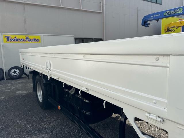 エルフトラック AT 4.45トン 全低床ボディ ワイドロング 荷台鉄板張 全席シートカバー付き 電格格納ミラー あおり開封補助装置 タンク100L 3方開 中型免許 車両重量3270kg 車両総重量7885kg 荷寸435×208×39 外寸614×217×232(38枚目)