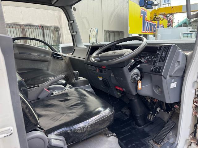 エルフトラック AT 4.45トン 全低床ボディ ワイドロング 荷台鉄板張 全席シートカバー付き 電格格納ミラー あおり開封補助装置 タンク100L 3方開 中型免許 車両重量3270kg 車両総重量7885kg 荷寸435×208×39 外寸614×217×232(44枚目)