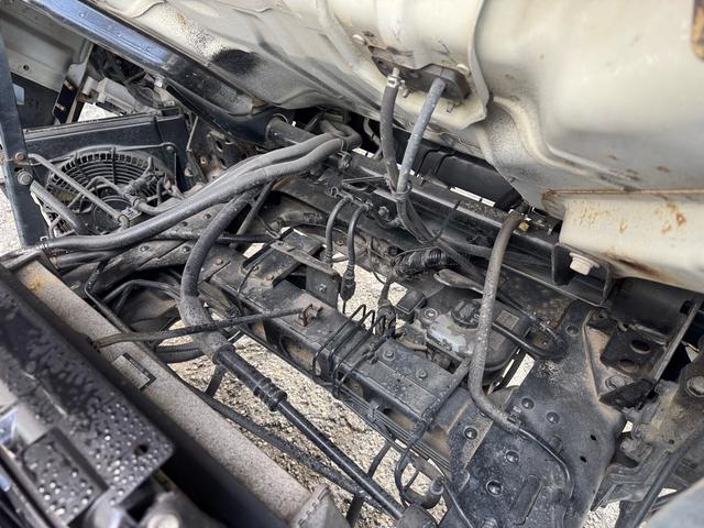 エルフトラック AT 4.45トン 全低床ボディ ワイドロング 荷台鉄板張 全席シートカバー付き 電格格納ミラー あおり開封補助装置 タンク100L 3方開 中型免許 車両重量3270kg 車両総重量7885kg 荷寸435×208×39 外寸614×217×232(72枚目)