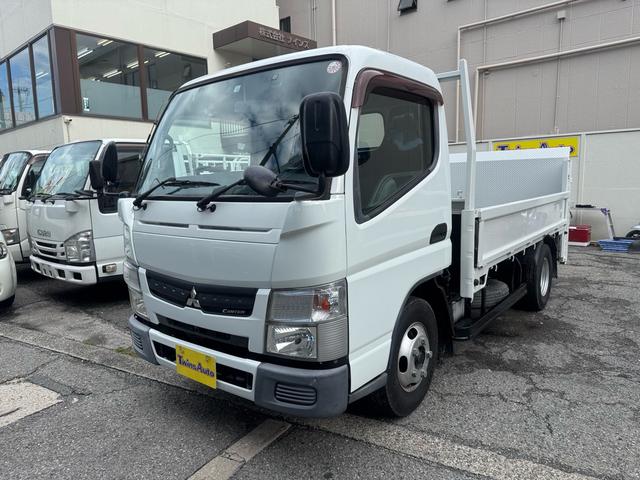 キャンター AT 2トン 全低床平ボディ パワーゲート 荷台板張 パワーゲート新明和 垂直パワーゲート リモコン 全席シートカバー付き 荷台ゴムマット 走行15.000キロ台 5t限定中型免許 車両重量2550kg 車両総重量4715kg 荷寸347×179×38(21枚目)