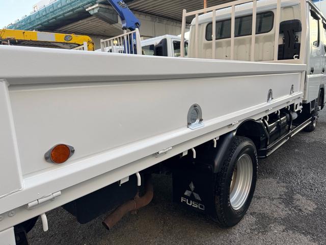 キャンター AT 2トン Wキャブ ワイドロング 荷台板張り 荷台塗装済 ナビ リアヒーター・クーラー ダブルエアコン 両側電格ミラー 乗車定員7人 ETC 8t限定中型免許 車両重量2870kg 車両総重量5255kg 荷寸335×191×38 外寸618×200×226(41枚目)