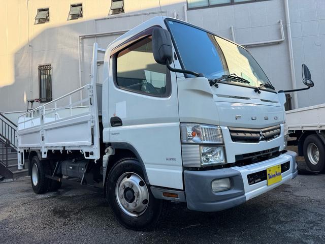 キャンター ＡＴ　４トン　平ボディ　パワーゲート付き　ワイドロング　極東垂直式パワーゲート（Ｖ６０３Ｂ－１ＭＫＴ２）　荷台鉄板張り　２段階式あおり　電格格納ミラー　８ｔ限定中型免許　車両重量３５９０ｋｇ　車両総重量７７５５ｋｇ　荷寸４３３×１９８×２２８（7枚目）