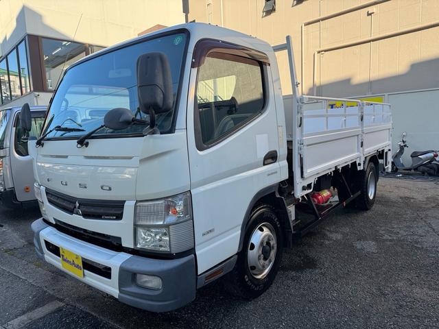 キャンター ＡＴ　４トン　平ボディ　パワーゲート付き　ワイドロング　極東垂直式パワーゲート（Ｖ６０３Ｂ－１ＭＫＴ２）　荷台鉄板張り　２段階式あおり　電格格納ミラー　８ｔ限定中型免許　車両重量３５９０ｋｇ　車両総重量７７５５ｋｇ　荷寸４３３×１９８×２２８（21枚目）