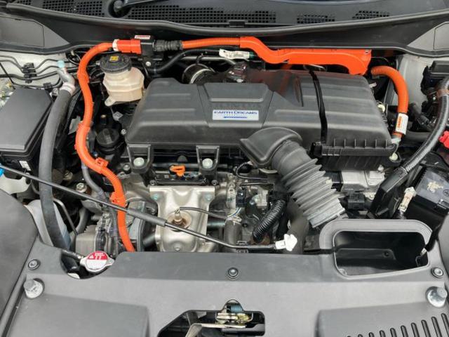 オデッセイハイブリッド ｅＨＥＶアブソルート・ＥＸ　保証書／純正　１０インチ　ＳＤナビ／ホンダセンシング／両側電動スライドドア／シートヒーター　前席／マルチビューカメラシステム／車線逸脱防止支援システム／シート　ハーフレザー／電動バックドア　電動シート（50枚目）
