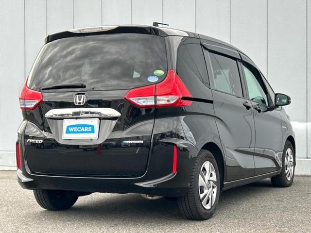 フリードハイブリッド ハイブリッドＧホンダセンシング　保証書／純正　ＳＤナビ／ホンダセンシング／両側電動スライドドア／車線逸脱防止支援システム／ヘッドランプ　ＬＥＤ／Ｂｌｕｅｔｏｏｔｈ接続／ＥＴＣ／ＥＢＤ付ＡＢＳ／横滑り防止装置／アイドリングストップ（3枚目）