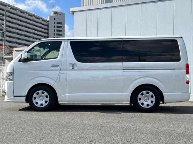 ハイエースバン ロングスーパーGLダークプライム2 社外エアロ/保証書/ディスプレイオーディオ11インチ/フリップダウンモニター 社外 12.8インチ/デジタルインナーミラー/トヨタセーフティセンス/両側電動スライドドア 衝突被害軽減システム ドラレコ(2枚目)
