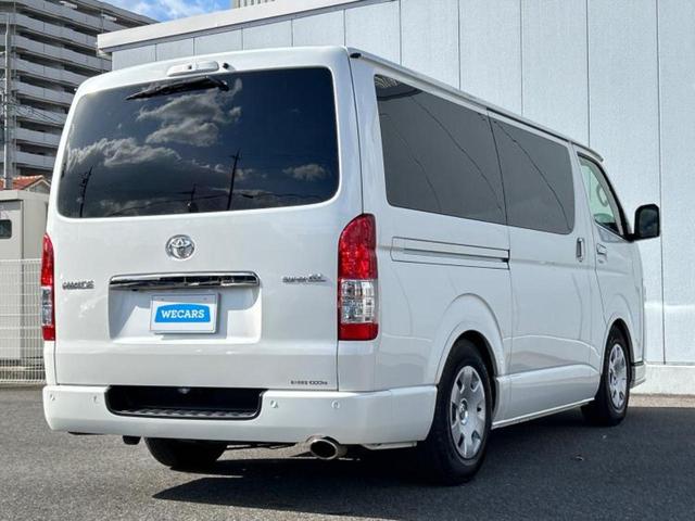 ハイエースバン ロングスーパーGLダークプライム2 社外エアロ/保証書/ディスプレイオーディオ11インチ/フリップダウンモニター 社外 12.8インチ/デジタルインナーミラー/トヨタセーフティセンス/両側電動スライドドア 衝突被害軽減システム ドラレコ(3枚目)