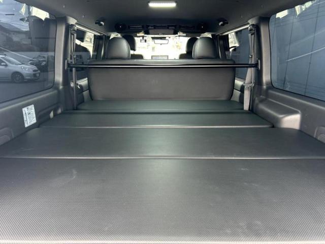 ハイエースバン ロングスーパーGLダークプライム2 社外エアロ/保証書/ディスプレイオーディオ11インチ/フリップダウンモニター 社外 12.8インチ/デジタルインナーミラー/トヨタセーフティセンス/両側電動スライドドア 衝突被害軽減システム ドラレコ(20枚目)