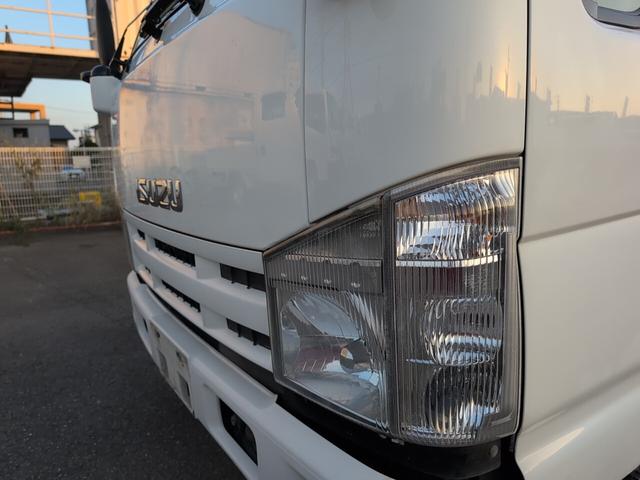 エルフトラック フラットロー　２トン積載！　低床！　ディーゼルターボ！　トラック１　全長４６９０　幅１６９０　荷台寸法３１００　１６００　５ＭＴ！　三方開き！（25枚目）