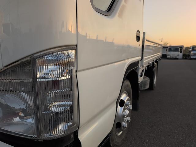 エルフトラック フラットロー　２トン積載！　低床！　ディーゼルターボ！　トラック１　全長４６９０　幅１６９０　荷台寸法３１００　１６００　５ＭＴ！　三方開き！（26枚目）