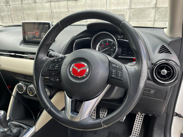 デミオ ＸＤツーリング　Ｌパッケージ　／スマートシティブレーキサポート／純正ナビ／Ｂｌｕｅｔｏｏｔｈ対応／バックカメラ／ドライブレコーダー／ＥＴＣ／ＬＥＤヘッドライト／純正１６インチアルミホイール／スマートキー／エンジンプッシュスタート（25枚目）