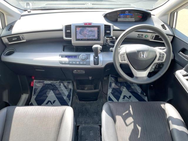 フリードハイブリッド ジャストセレクション 両側電動ドア 純正SDナビ バックカメラ ハーフレザーシート スマートキー HIDヘッド ビルトインETC クルコン オートライト オートエアコン 純正15インチアルミ Bluetooth CD(2枚目)