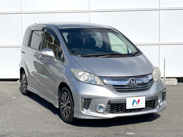 フリードハイブリッド ジャストセレクション 両側電動ドア 純正SDナビ バックカメラ ハーフレザーシート スマートキー HIDヘッド ビルトインETC クルコン オートライト オートエアコン 純正15インチアルミ Bluetooth CD(16枚目)