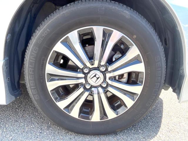 フリードハイブリッド ジャストセレクション 両側電動ドア 純正SDナビ バックカメラ ハーフレザーシート スマートキー HIDヘッド ビルトインETC クルコン オートライト オートエアコン 純正15インチアルミ Bluetooth CD(40枚目)