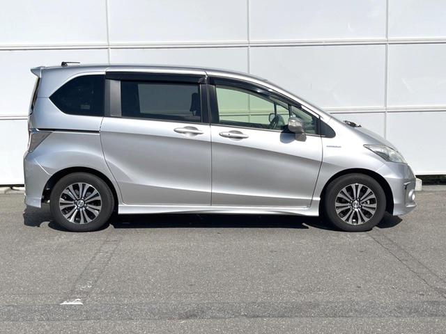 フリードハイブリッド ジャストセレクション 両側電動ドア 純正SDナビ バックカメラ ハーフレザーシート スマートキー HIDヘッド ビルトインETC クルコン オートライト オートエアコン 純正15インチアルミ Bluetooth CD(45枚目)