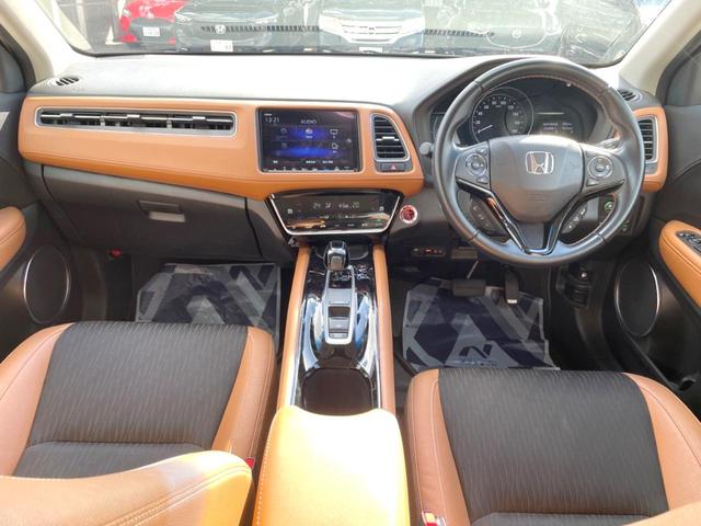 ヴェゼル ハイブリッドZ・ホンダセンシング 純正SDナビ バックカメラ 衝突被害軽減システム レーダークルーズ ハーフレザーシート ドラレコ スマートキー LEDヘッド ビルトインETC オートライト オートエアコン 純正17インチアルミ(2枚目)