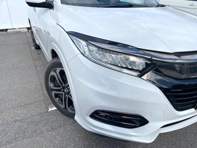 ヴェゼル ハイブリッドZ・ホンダセンシング 純正SDナビ バックカメラ 衝突被害軽減システム レーダークルーズ ハーフレザーシート ドラレコ スマートキー LEDヘッド ビルトインETC オートライト オートエアコン 純正17インチアルミ(12枚目)