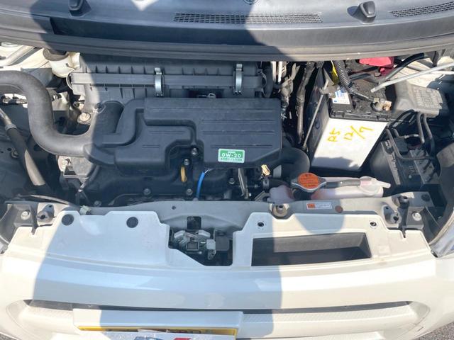 ムーヴ カスタム　Ｘリミテッド　バックカメラ　スマートキー　ＨＩＤヘッド　純正１４インチアルミ　オートエアコン　ＣＤ　地デジ（18枚目）