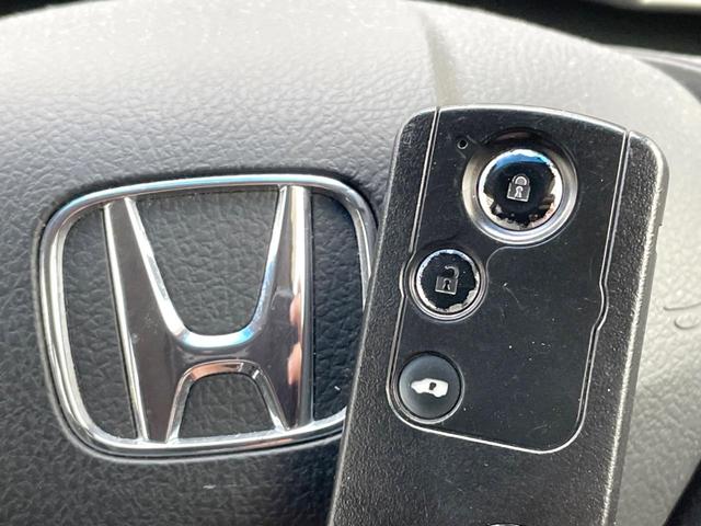 フリード Ｇ　ジャストセレクション＋　電動スライドドア　純正ＳＤナビ　バックカメラ　ハーフレザーシート　スマートキー　ＨＩＤヘッド　ビルトインＥＴＣ　オートライト　オートエアコン　Ｂｌｕｅｔｏｏｔｈ　ＣＤ　ＤＶＤ再生　フルセグ（7枚目）