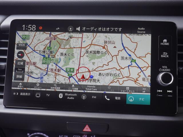 フィット ｅ：ＨＥＶホーム　弊社元デモカー　純正９インチナビ　ＥＴＣ　アダプティブクルーズコントロール　純正フロントドラレコ　全周囲カメラ　障害物センサー　ＬＥＤヘッドライト　衝突被害軽減ブレーキ　ホンダセンシング（3枚目）