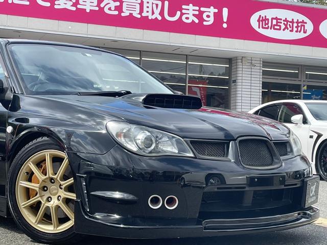 ＷＲＸ　ＳＴｉ　６速ミッション／エアロ／ＧＴウイング／柿本マフラー／車高調／追加メーター／純正アルミホイール／ブレンボ／ＨＩＤヘッドライト／ＥＴＣ(11枚目)