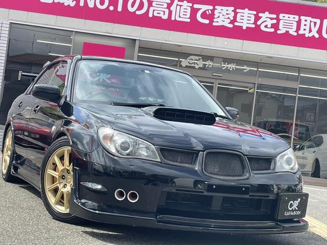 ＷＲＸ　ＳＴｉ　６速ミッション／エアロ／ＧＴウイング／柿本マフラー／車高調／追加メーター／純正アルミホイール／ブレンボ／ＨＩＤヘッドライト／ＥＴＣ(63枚目)