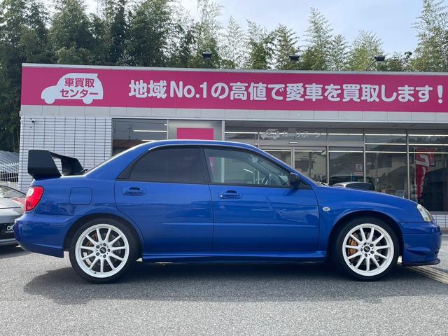 ＷＲＸ　ＳＴｉ　アプライドＥ　６速ミッション／エアロ／ＳＴＩマフラー／ＳＴＩタワーバー／ＷＯＲＫ１８インチアルミホイール／ＢＬＩＴＺラジエター／ＨＩＤヘッドライト／ナビ(9枚目)