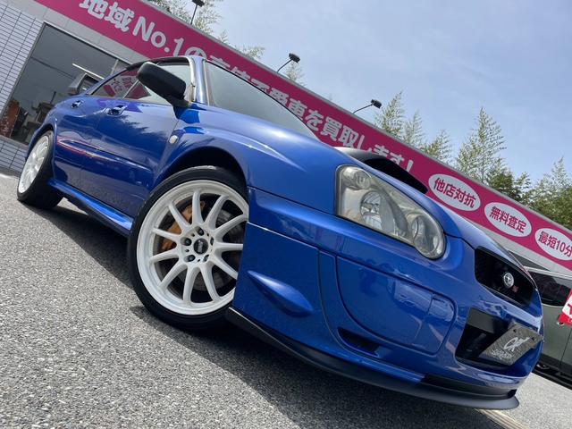 ＷＲＸ　ＳＴｉ　アプライドＥ　６速ミッション／エアロ／ＳＴＩマフラー／ＳＴＩタワーバー／ＷＯＲＫ１８インチアルミホイール／ＢＬＩＴＺラジエター／ＨＩＤヘッドライト／ナビ(24枚目)