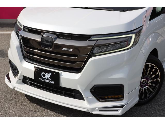 ステップワゴンスパーダ スパーダ・クールスピリット　ホンダセンシング　無限エアロ／無限アルミ／無限フロアーマット／４本出しマフラー／純正１０型ナビＴＶ／フリップダウンモニター／シートヒーター／両側電動スライドドア／レーダークルーズ／ＥＴＣ２．０／前後ドラレコ／１オーナー（7枚目）