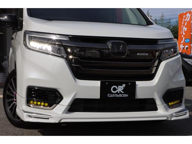 ステップワゴンスパーダ スパーダ・クールスピリット　ホンダセンシング　無限エアロ／無限アルミ／無限フロアーマット／４本出しマフラー／純正１０型ナビＴＶ／フリップダウンモニター／シートヒーター／両側電動スライドドア／レーダークルーズ／ＥＴＣ２．０／前後ドラレコ／１オーナー（12枚目）