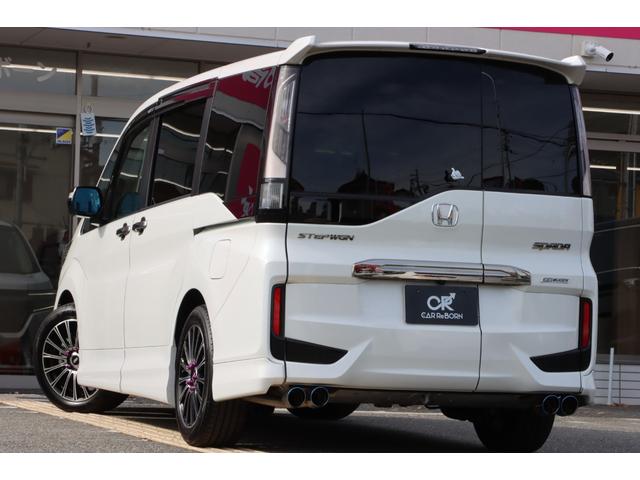 ステップワゴンスパーダ スパーダ・クールスピリット　ホンダセンシング　無限エアロ／無限アルミ／無限フロアーマット／４本出しマフラー／純正１０型ナビＴＶ／フリップダウンモニター／シートヒーター／両側電動スライドドア／レーダークルーズ／ＥＴＣ２．０／前後ドラレコ／１オーナー（23枚目）
