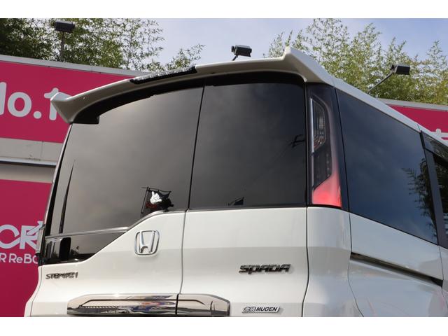 ステップワゴンスパーダ スパーダ・クールスピリット　ホンダセンシング　無限エアロ／無限アルミ／無限フロアーマット／４本出しマフラー／純正１０型ナビＴＶ／フリップダウンモニター／シートヒーター／両側電動スライドドア／レーダークルーズ／ＥＴＣ２．０／前後ドラレコ／１オーナー（75枚目）