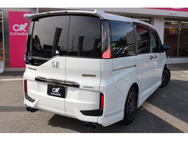 ステップワゴンスパーダ スパーダ・クールスピリット　ホンダセンシング　無限エアロ／無限アルミ／無限フロアーマット／４本出しマフラー／純正１０型ナビＴＶ／フリップダウンモニター／シートヒーター／両側電動スライドドア／レーダークルーズ／ＥＴＣ２．０／前後ドラレコ／１オーナー（77枚目）