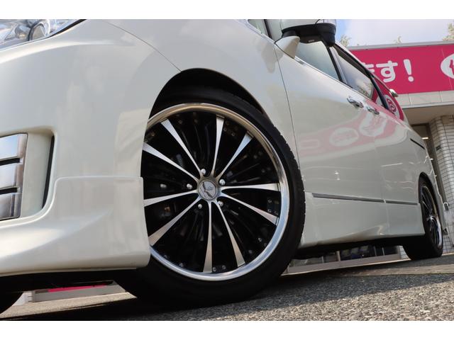 エルグランド ライダー　黒本革シート　マニュアルシート　サンルーフ／エアロ／ＲＡＹＳ２０インチアルミ／ＴＥＩＮ車高調／ニスモマフラー／黒革シート／７人乗りオットマン／ナビ・フルセグＴＶ／両側電動スライドドア／ＨＩＤヘッドライト／ＥＴＣ／スマートキー／禁煙（11枚目）