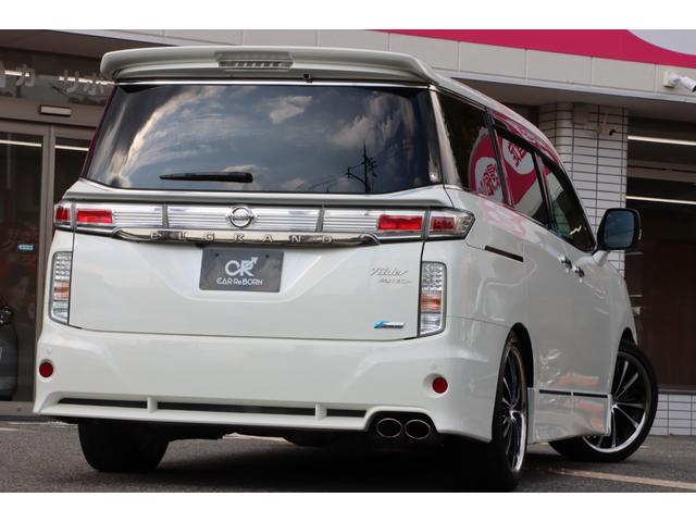 エルグランド ライダー　黒本革シート　マニュアルシート　サンルーフ／エアロ／ＲＡＹＳ２０インチアルミ／ＴＥＩＮ車高調／ニスモマフラー／黒革シート／７人乗りオットマン／ナビ・フルセグＴＶ／両側電動スライドドア／ＨＩＤヘッドライト／ＥＴＣ／スマートキー／禁煙（20枚目）