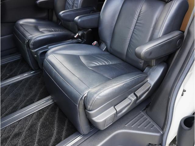 エルグランド ライダー　黒本革シート　マニュアルシート　サンルーフ／エアロ／ＲＡＹＳ２０インチアルミ／ＴＥＩＮ車高調／ニスモマフラー／黒革シート／７人乗りオットマン／ナビ・フルセグＴＶ／両側電動スライドドア／ＨＩＤヘッドライト／ＥＴＣ／スマートキー／禁煙（45枚目）