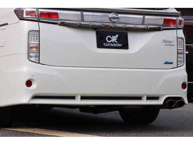 エルグランド ライダー　黒本革シート　マニュアルシート　サンルーフ／エアロ／ＲＡＹＳ２０インチアルミ／ＴＥＩＮ車高調／ニスモマフラー／黒革シート／７人乗りオットマン／ナビ・フルセグＴＶ／両側電動スライドドア／ＨＩＤヘッドライト／ＥＴＣ／スマートキー／禁煙（70枚目）